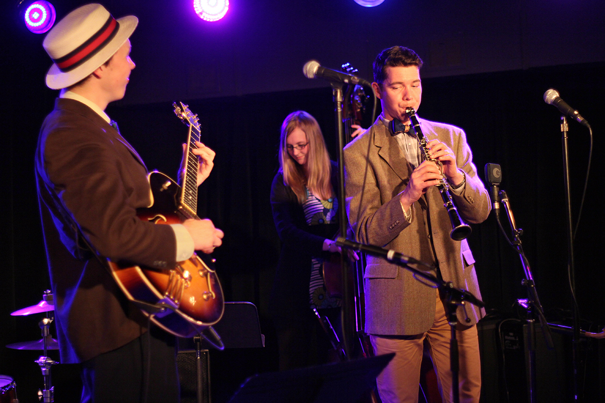 The Arntzen Brothers play the Bassment in Saskatoon. Evan Arntzen, right, was featured on the clarinet and saxophone, with his brother Arnt, left, holding it down on banjo and guitar (seen here). The brothers were joined by Jennifer Hodge on bass. Photo taken Tuesday, April 23, 2013.