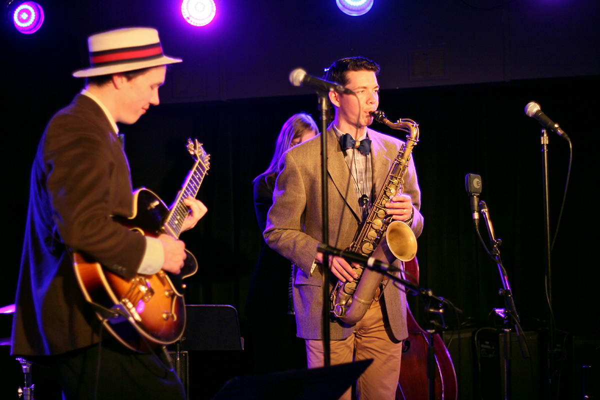 The Arntzen Brothers play the Bassment in Saskatoon. Evan Arntzen, right, switches to his sax to jam with his brother Arnt on guitar. Photo taken Tuesday, April 23, 2013.