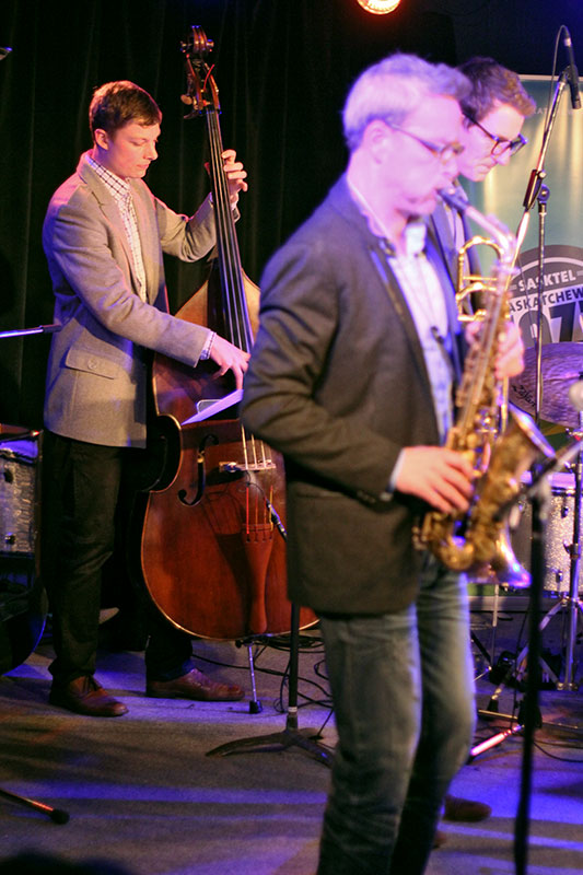 The Story of Jazz. Soren Nissen holds it down on the bass at the Story of Jazz. Photo taken Tuesday, April 30, 2013.