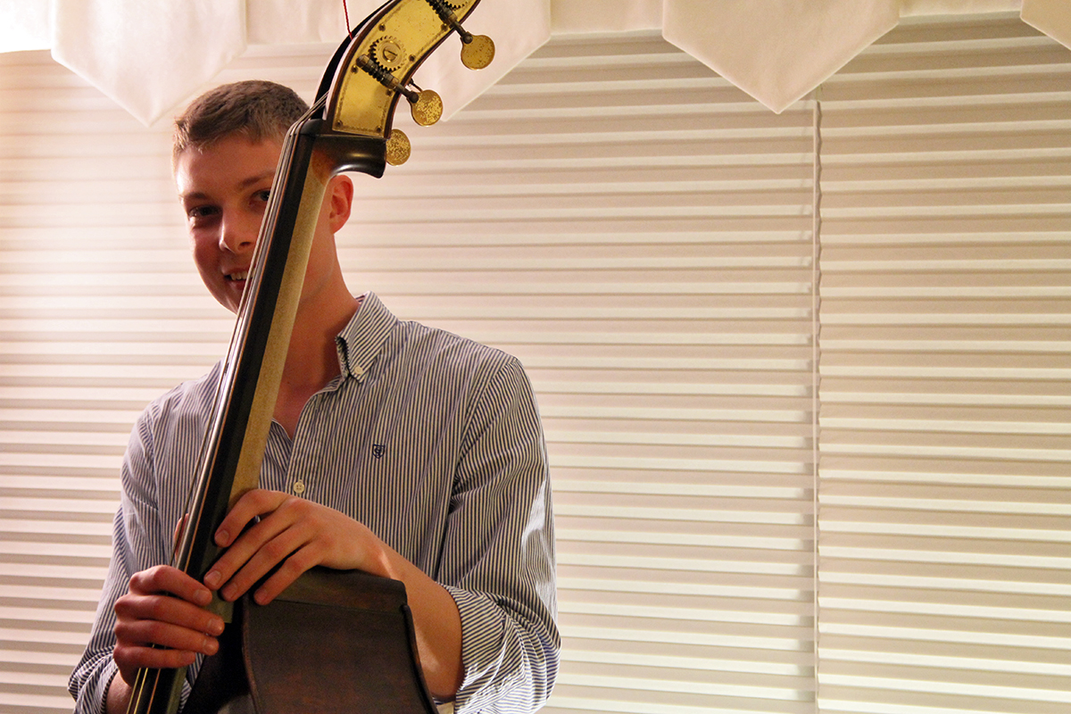 The Soren Nissen, Ian Wright and Nate Renner trio. Nissen looking sheepish behind his bass. Photo taken Friday, May 17, 2013.